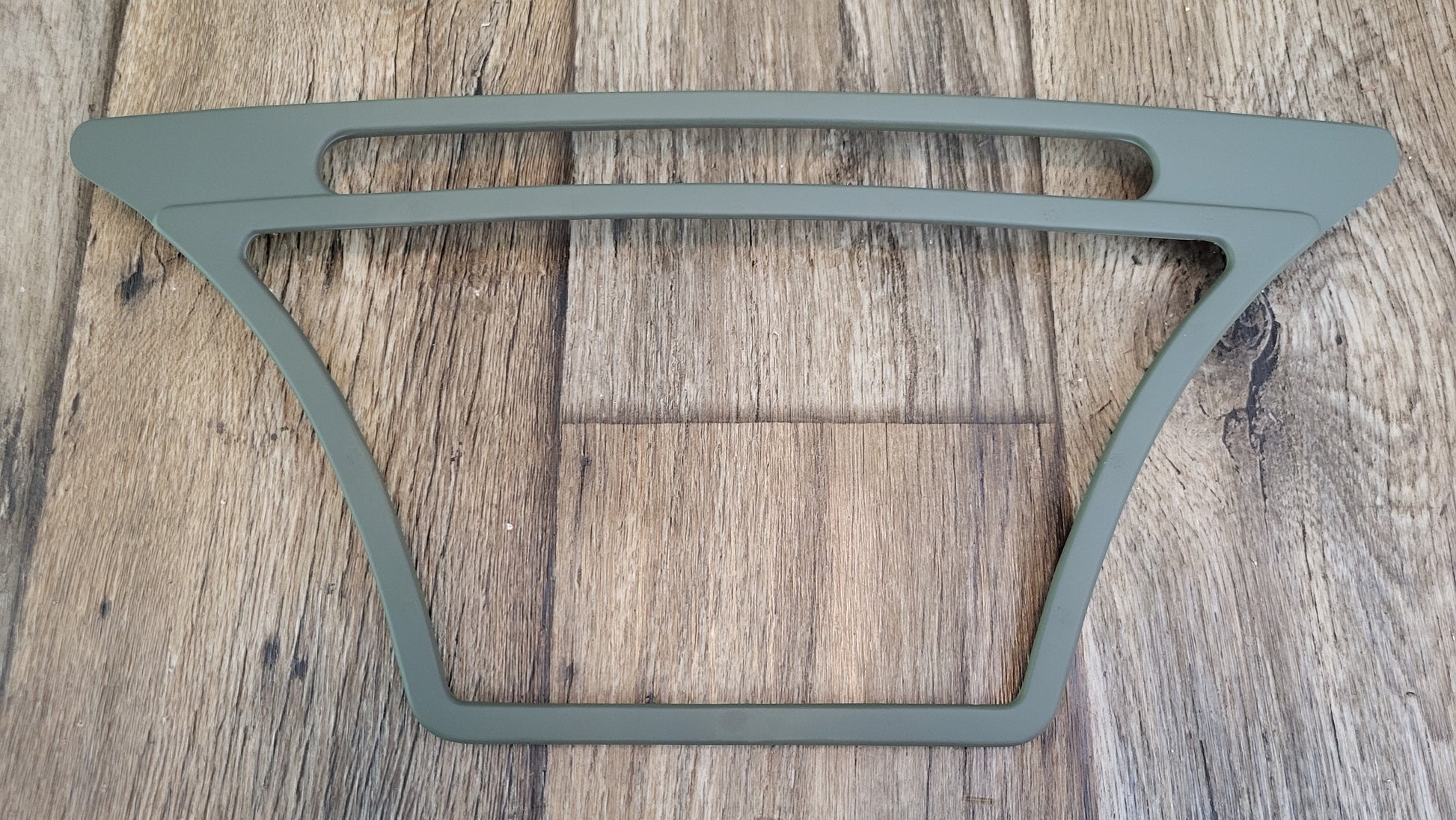 C2 Corvette Speaker Grille in Zinc-Chromate epoxy primer before leather wrapping.